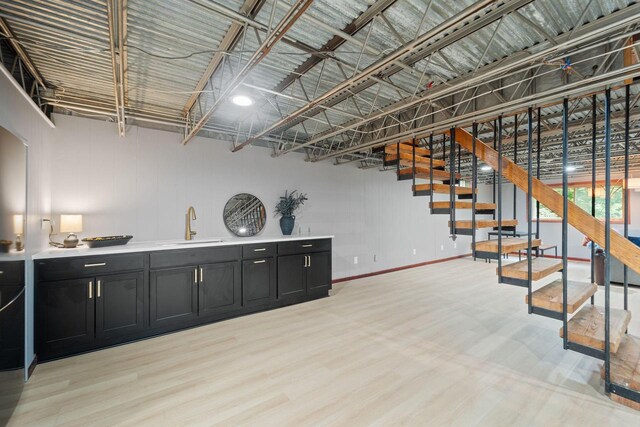 4326 Taylor Ave, Mount Pleasant, WI 53405 - bar with light wood-type flooring and stairway