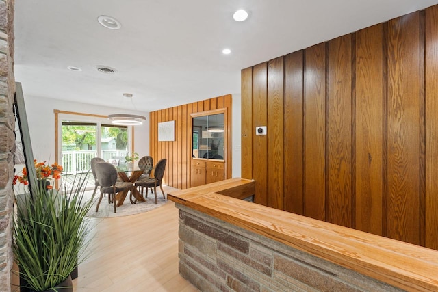 4326 Taylor Ave, Mount Pleasant, WI 53405 - interior space with light wood finished floors, wood walls, and recessed lighting