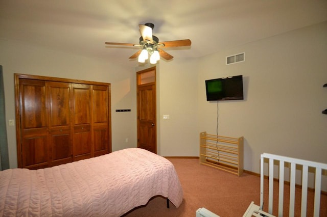 551 Bayberry Ln, Slinger, WI 53086 - carpeted bedroom with a closet and a ceiling fan