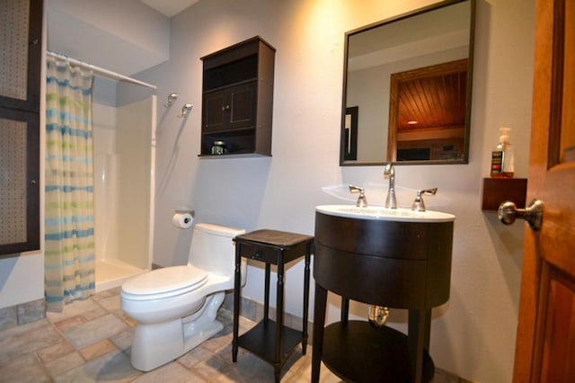551 Bayberry Ln, Slinger, WI 53086 - full bathroom featuring vanity and stone finish floors