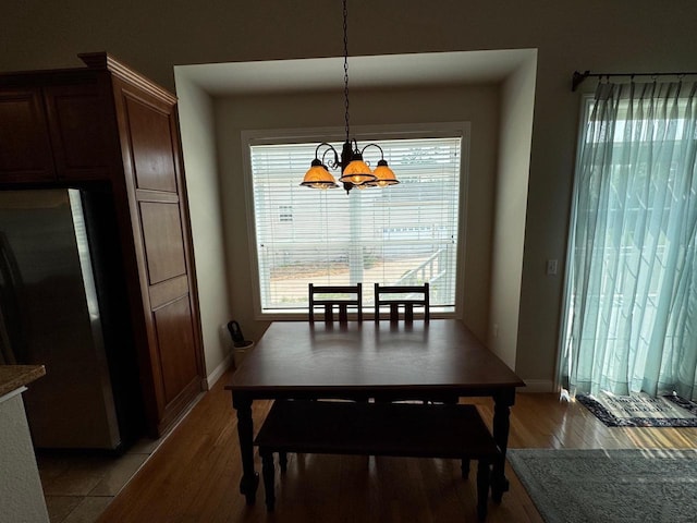 4126 Westerfield Ln, Madison, WI 53704 - dining room with a chandelier and light wood-style floors