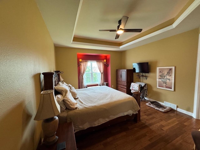 4126 Westerfield Ln, Madison, WI 53704 - bedroom with a raised ceiling, wood finished floors, and ceiling fan