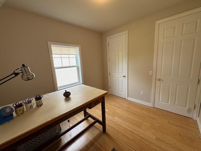 4126 Westerfield Ln, Madison, WI 53704 - home office featuring light wood finished floors and baseboards