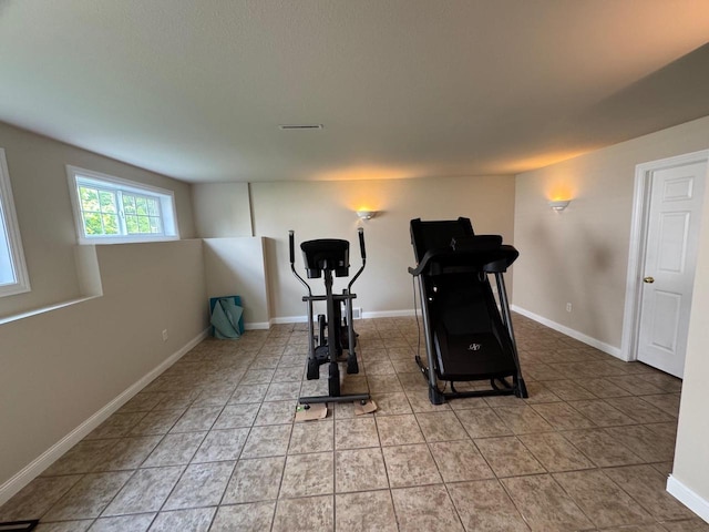 4126 Westerfield Ln, Madison, WI 53704 - exercise room with light tile patterned flooring and baseboards