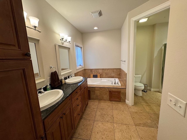 4126 Westerfield Ln, Madison, WI 53704 - bathroom featuring a garden tub, double vanity, and tile patterned floors