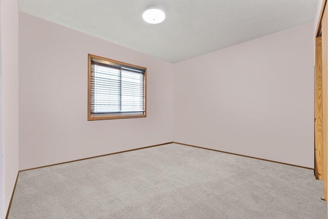 12129 221st Ave, Bristol, WI 53104 - unfurnished room with carpet flooring and baseboards