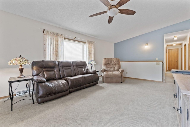12129 221st Ave, Bristol, WI 53104 - carpeted living area with lofted ceiling, ceiling fan, and a textured ceiling