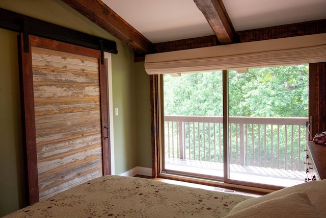 890 Windsor Dr Unit 4, Fontana, WI 53125 - unfurnished bedroom featuring beam ceiling and access to outside
