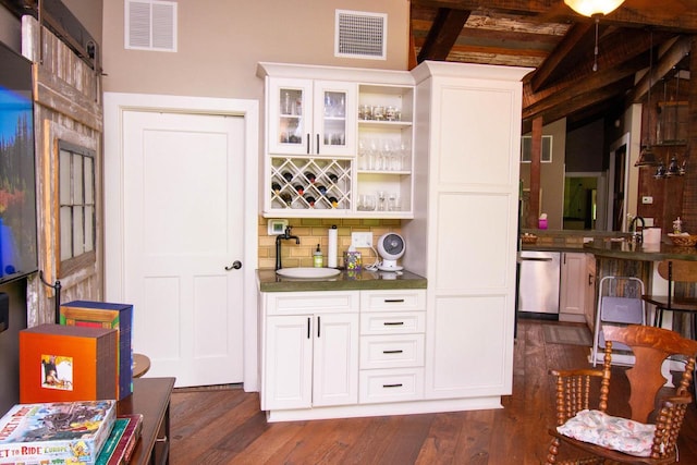 890 Windsor Dr Unit 4, Fontana, WI 53125 - indoor wet bar with dishwasher and dark wood-style floors