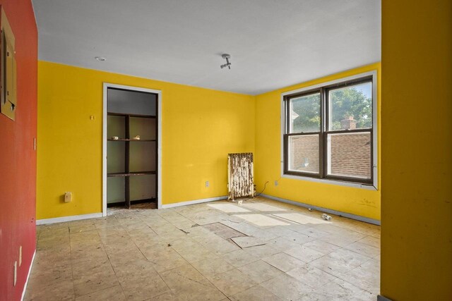 1049 E Johnson St, Madison, WI 53703 - empty room with baseboards