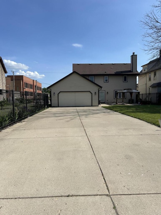 1304 W Garfield Ave, Milwaukee, WI 53205 - view of front of home with a chimney
