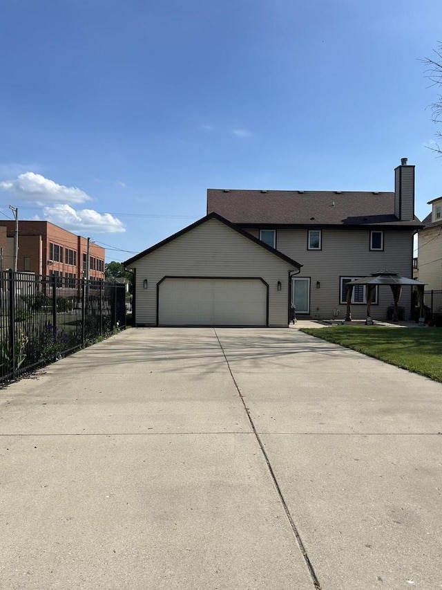 1304 W Garfield Ave, Milwaukee, WI 53205 - view of front facade with a chimney