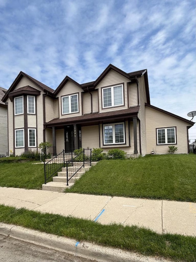 1304 W Garfield Ave, Milwaukee, WI 53205 - view of front facade with an attached garage and a front lawn