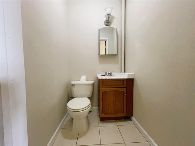 628 W Cedar St, Chippewa Falls, WI 54729 - half bath with vanity and tile patterned floors