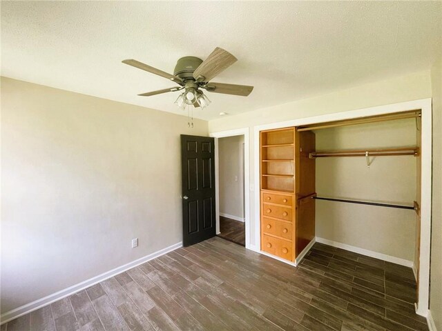 628 W Cedar St, Chippewa Falls, WI 54729 - unfurnished bedroom featuring wood finished floors, a closet, and ceiling fan