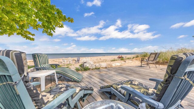 N133 Surfside Dr, Cedar Grove, WI 53013 - deck featuring view of water and beach