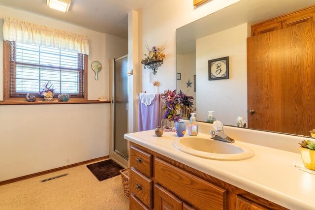 1360 Eminence St, Green Bay, WI 54313 - bathroom with vanity and a shower stall