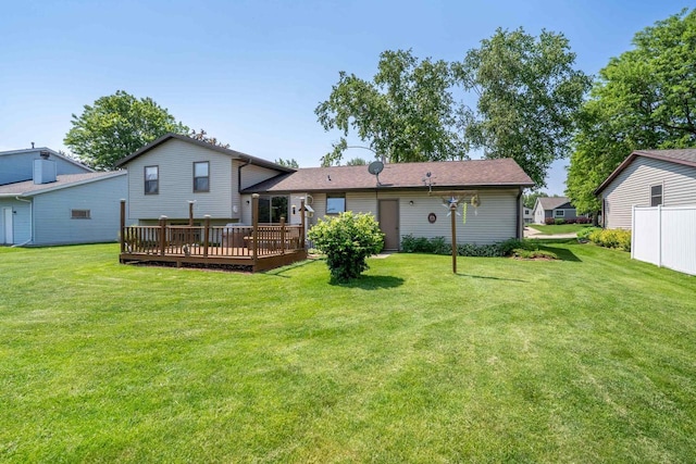 1360 Eminence St, Green Bay, WI 54313 - back of house with a deck and a yard