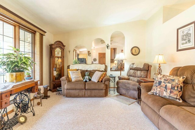 1360 Eminence St, Green Bay, WI 54313 - living room featuring carpet and arched walkways