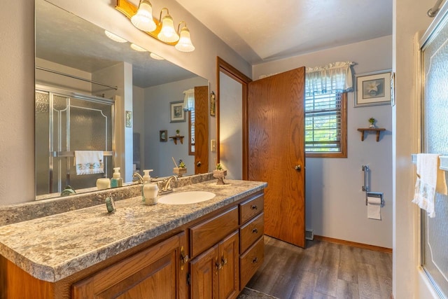 1360 Eminence St, Green Bay, WI 54313 - full bathroom with wood finished floors, vanity, and a stall shower