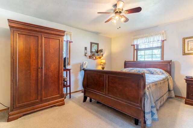 1360 Eminence St, Green Bay, WI 54313 - bedroom with light colored carpet and a ceiling fan