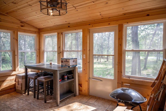 N8244 Woodland Trl, New Lisbon, WI 53950 - sunroom / solarium with lofted ceiling, plenty of natural light, and wooden ceiling