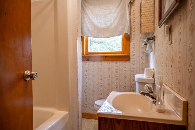 N8244 Woodland Trl, New Lisbon, WI 53950 - bathroom with wallpapered walls, vanity, and shower / bath combination