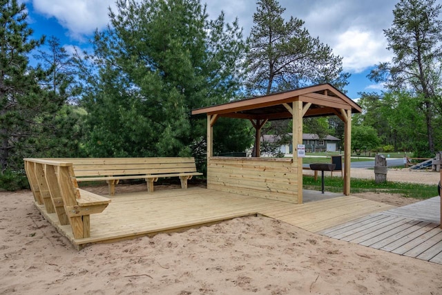 N8244 Woodland Trl, New Lisbon, WI 53950 - view of community featuring a wooden deck