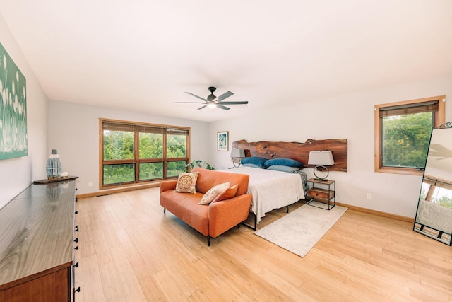 W301S1487 Brandybrook Rd, Waukesha, WI 53188 - bedroom with multiple windows, light wood finished floors, and ceiling fan