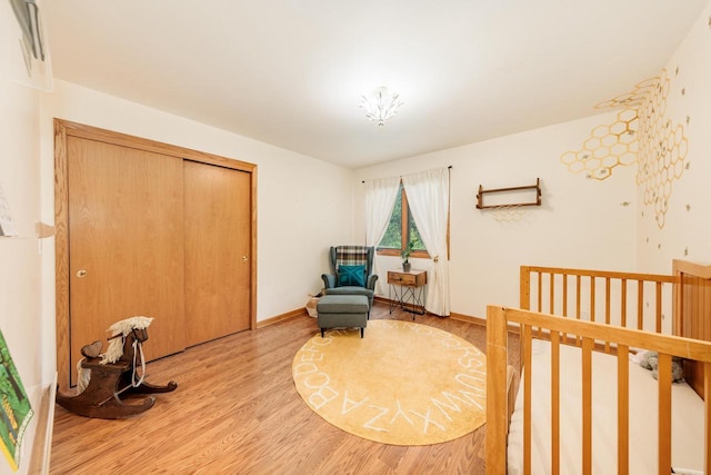 W301S1487 Brandybrook Rd, Waukesha, WI 53188 - bedroom featuring wood finished floors and a closet