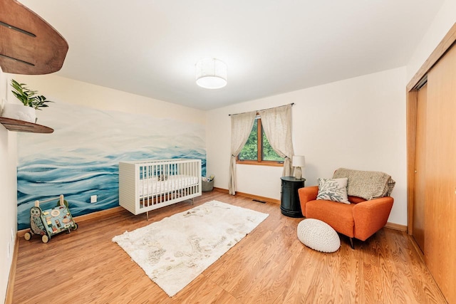 W301S1487 Brandybrook Rd, Waukesha, WI 53188 - bedroom featuring wood finished floors and a closet