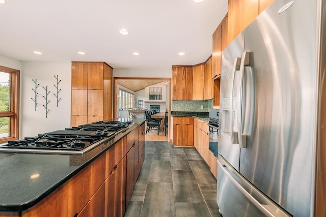 W301S1487 Brandybrook Rd, Waukesha, WI 53188 - kitchen with stainless steel refrigerator with ice dispenser, modern cabinets, gas cooktop, tasteful backsplash, and recessed lighting