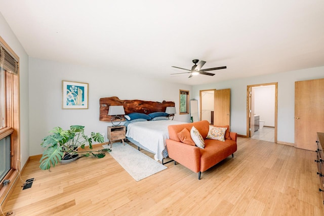 W301S1487 Brandybrook Rd, Waukesha, WI 53188 - bedroom featuring light wood finished floors, ceiling fan, and multiple windows
