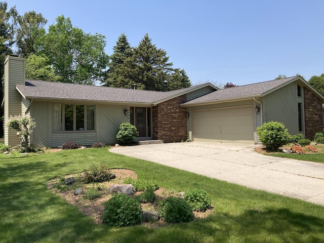 3988 S 18th St, Sheboygan, WI 53081 - view of front of property with an attached garage, a chimney, a front yard, concrete driveway, and brick siding