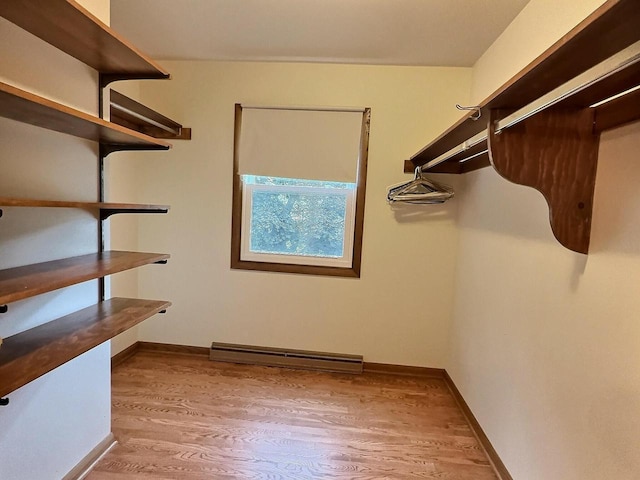 525 Pembrook Ct, Neenah, WI 54956 - spacious closet featuring wood finished floors and baseboard heating
