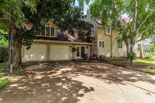 1329 23rd Ave, Monroe, WI 53566 - view of front facade featuring a garage and driveway