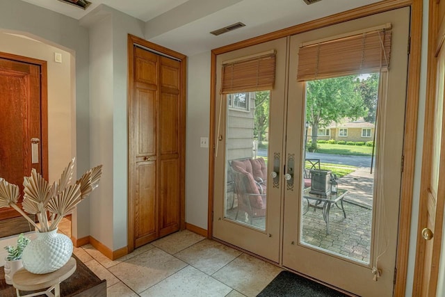 1329 23rd Ave, Monroe, WI 53566 - entryway featuring french doors and light tile patterned flooring