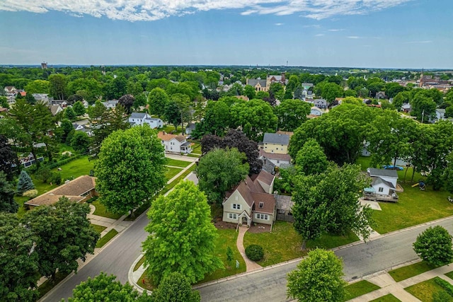 1329 23rd Ave, Monroe, WI 53566 - aerial view of residential area featuring a tree filled landscape