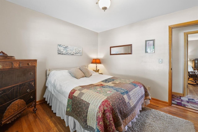 435 S Main St, Markesan, WI 53946 - bedroom featuring wood finished floors and baseboards