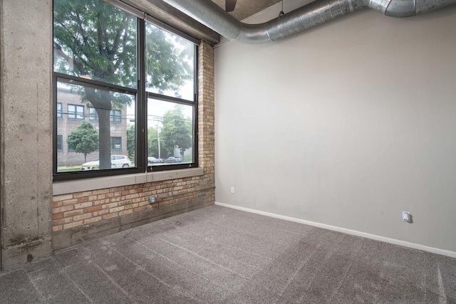 1924 N Hubbard St Unit 109, Milwaukee, WI 53212 - carpeted spare room featuring baseboards
