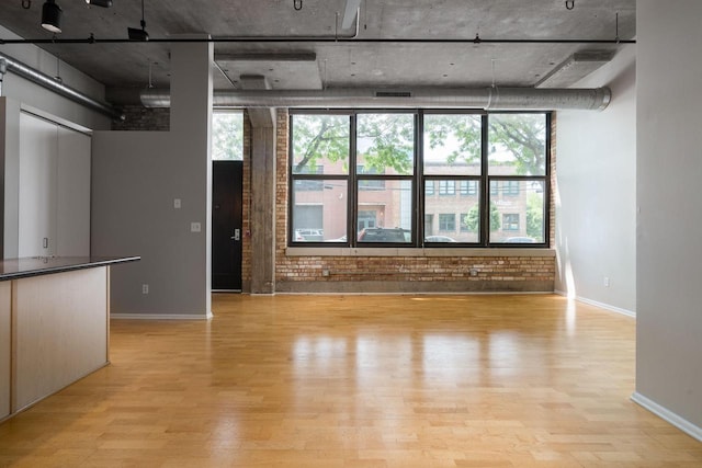 1924 N Hubbard St Unit 109, Milwaukee, WI 53212 - empty room featuring light wood-type flooring and baseboards