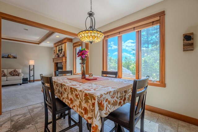 303 Rimrock Rd, Wausau, WI 54401 - dining area featuring plenty of natural light, carpet flooring, recessed lighting, and stone finish floors