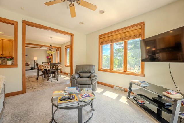 303 Rimrock Rd, Wausau, WI 54401 - living area featuring a ceiling fan and light colored carpet