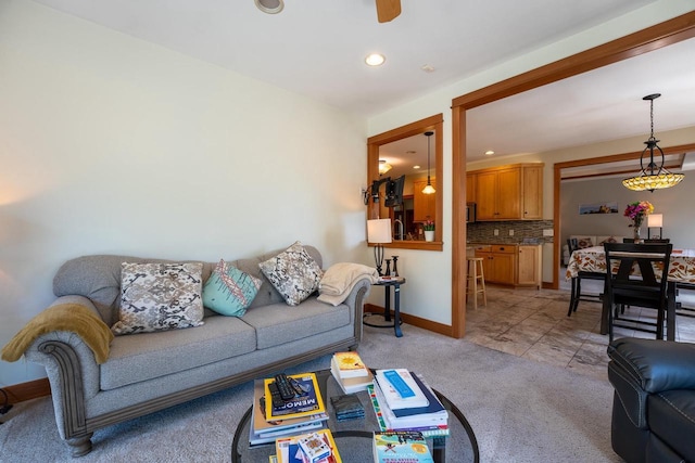 303 Rimrock Rd, Wausau, WI 54401 - living area with light carpet, ceiling fan, and recessed lighting