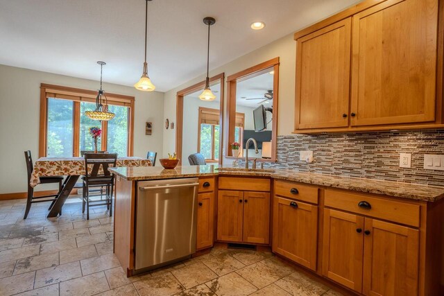 303 Rimrock Rd, Wausau, WI 54401 - kitchen with dishwasher, decorative backsplash, light stone counters, and recessed lighting