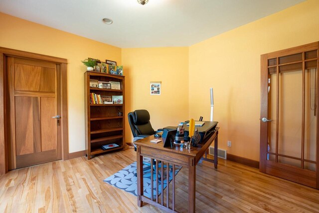 303 Rimrock Rd, Wausau, WI 54401 - home office featuring light wood-style flooring