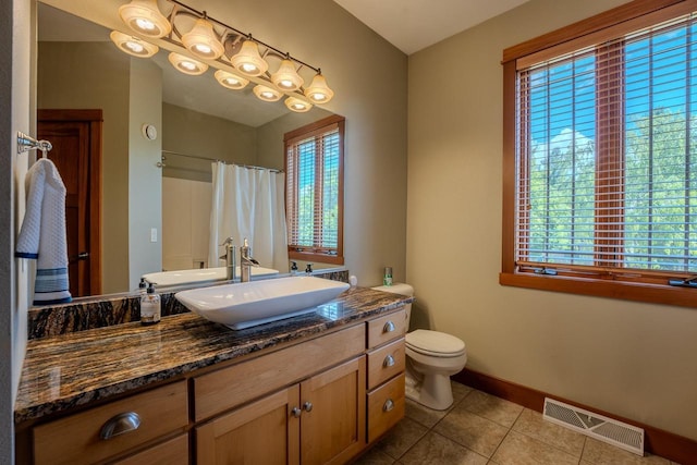 303 Rimrock Rd, Wausau, WI 54401 - full bathroom with tile patterned floors, vanity, and a shower with curtain
