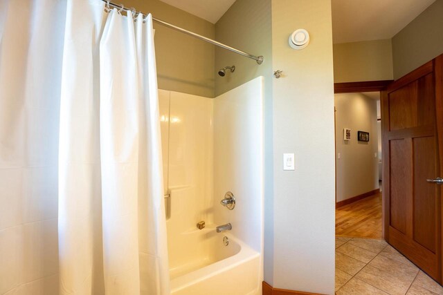 303 Rimrock Rd, Wausau, WI 54401 - full bathroom with shower / bathtub combination with curtain and tile patterned flooring