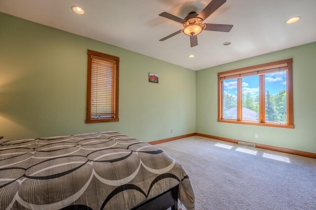 303 Rimrock Rd, Wausau, WI 54401 - carpeted bedroom featuring recessed lighting and a ceiling fan