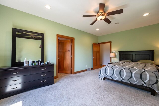 303 Rimrock Rd, Wausau, WI 54401 - bedroom featuring light carpet, recessed lighting, and a ceiling fan
